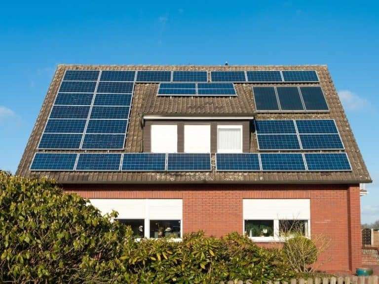 Solar panels on a house roof fitted vertical and horizontal 1