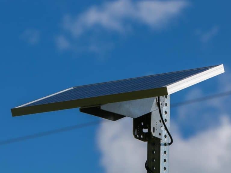200 watt solar panel tilted on a pole in the sun