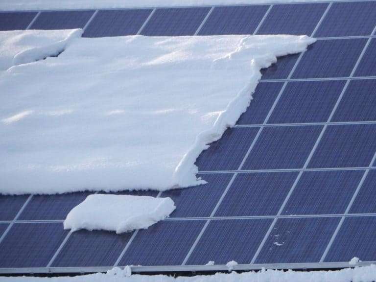 Snow on solar panels Half covered