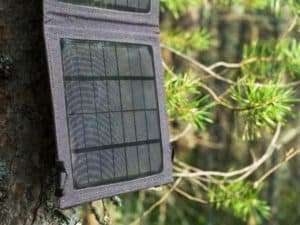 Portable solar panel on a tree